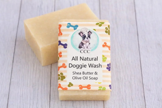 All natural dog wash soap bar with shea butter and olive oil for pets on wood surface